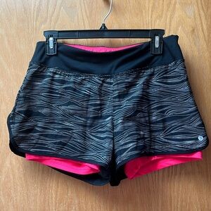 Women’s running shorts with built in pink spandex shorts